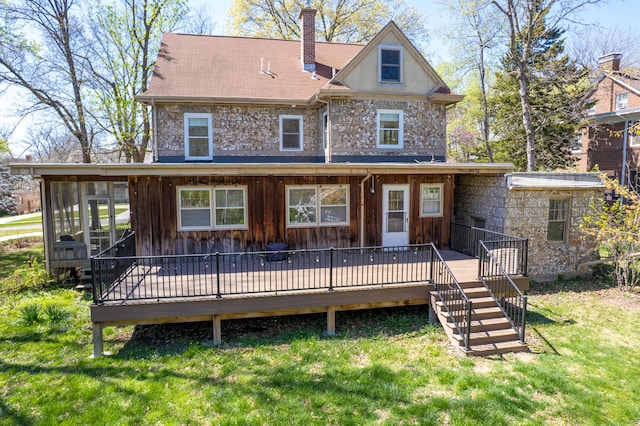 608 Westmount Ave, Columbia, MO 65203 - rear view of house featuring a deck, a chimney, a lawn, and a sunroom