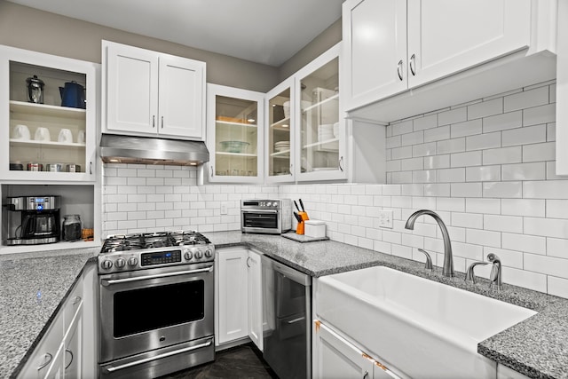 608 Westmount Ave, Columbia, MO 65203 - kitchen featuring stainless steel gas stove, range hood, a sink, and white cabinets
