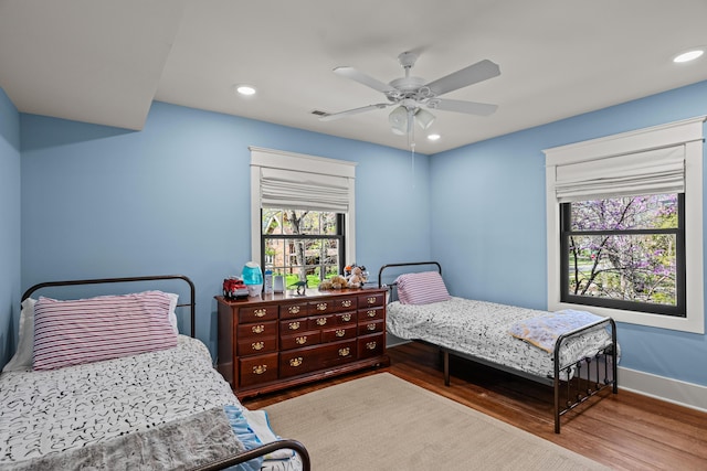 608 Westmount Ave, Columbia, MO 65203 - bedroom with wood finished floors, recessed lighting, baseboards, and a ceiling fan