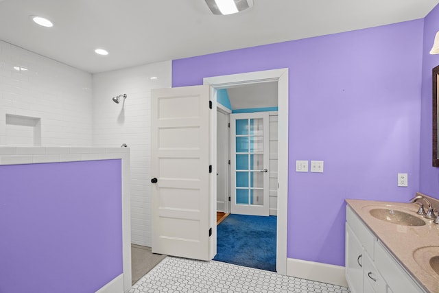 608 Westmount Ave, Columbia, MO 65203 - full bathroom featuring walk in shower, double vanity, recessed lighting, and baseboards