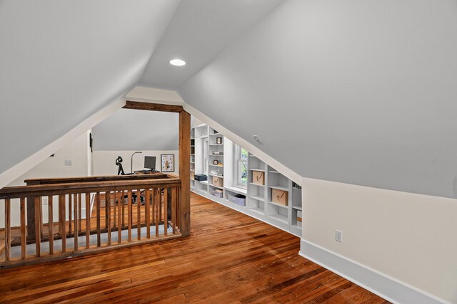 608 Westmount Ave, Columbia, MO 65203 - additional living space featuring built in shelves, hardwood / wood-style flooring, lofted ceiling, baseboards, and recessed lighting