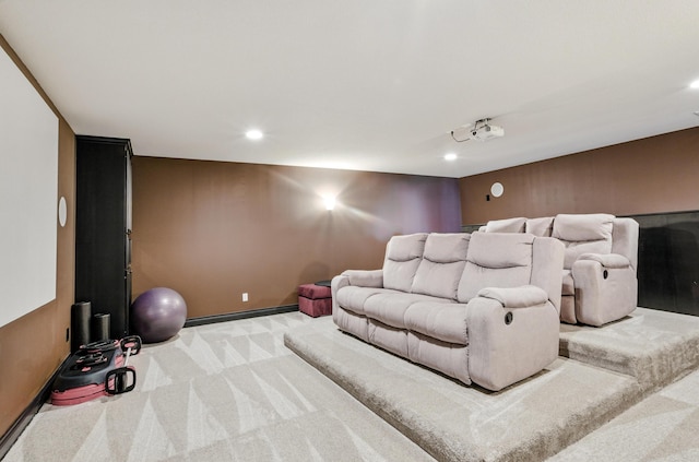 home theater room featuring light colored carpet, baseboards, and recessed lighting