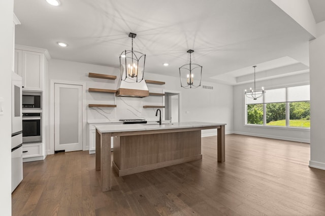 2816 Rivington Dr, Columbia, MO 65203 - kitchen with open shelves, appliances with stainless steel finishes, a chandelier, white cabinetry, and recessed lighting
