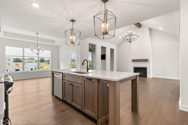 2816 Rivington Dr, Columbia, MO 65203 - kitchen with stainless steel dishwasher, a chandelier, dark wood-style floors, recessed lighting, and decorative light fixtures