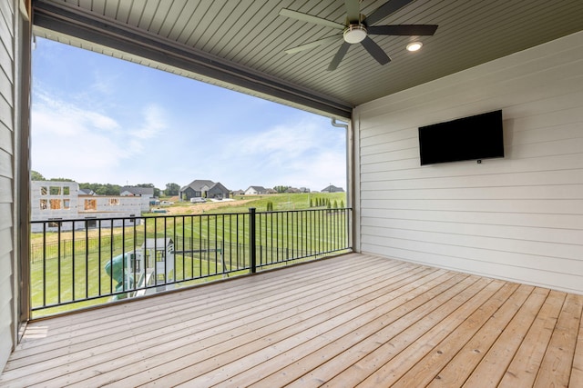 2816 Rivington Dr, Columbia, MO 65203 - wooden terrace featuring ceiling fan, a residential view, and a yard