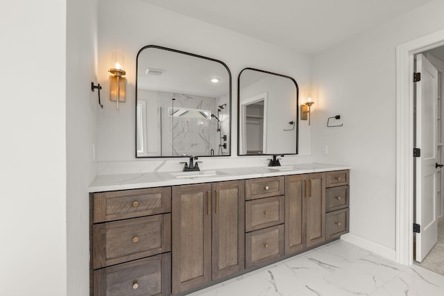 2816 Rivington Dr, Columbia, MO 65203 - bathroom with a marble finish shower, double vanity, and marble look tiles
