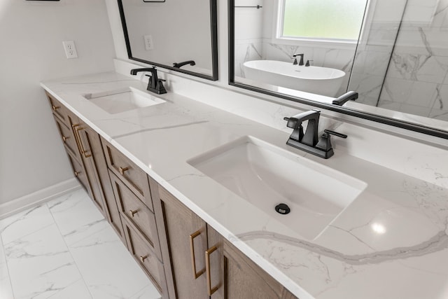 2816 Rivington Dr, Columbia, MO 65203 - full bathroom featuring double vanity, marble finish flooring, and a soaking tub