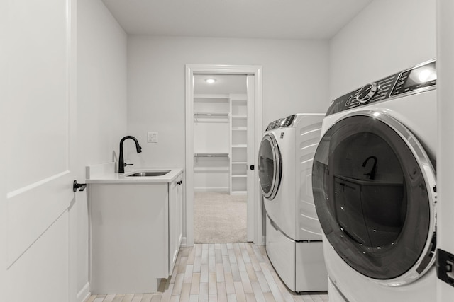 2816 Rivington Dr, Columbia, MO 65203 - laundry room with washing machine and dryer and cabinet space