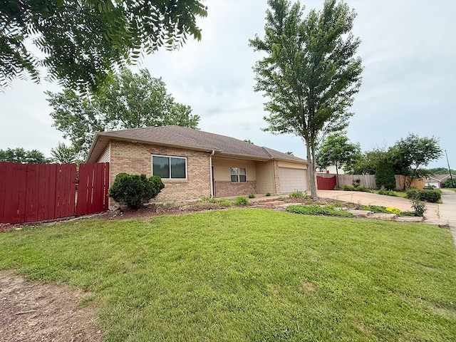 4204 Fourwinds Dr, Columbia, MO 65202 - ranch-style home featuring brick siding, driveway, and an attached garage
