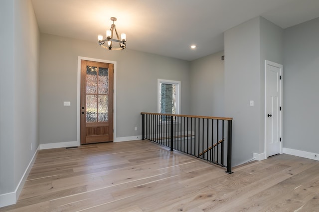 700 Brockton Dr, Columbia, MO 65201 - entryway featuring a chandelier, light wood finished floors, baseboards, and recessed lighting