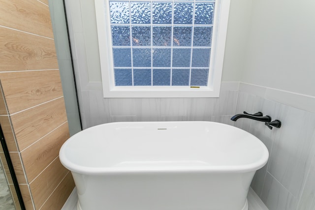 700 Brockton Dr, Columbia, MO 65201 - full bathroom with a freestanding tub and wainscoting