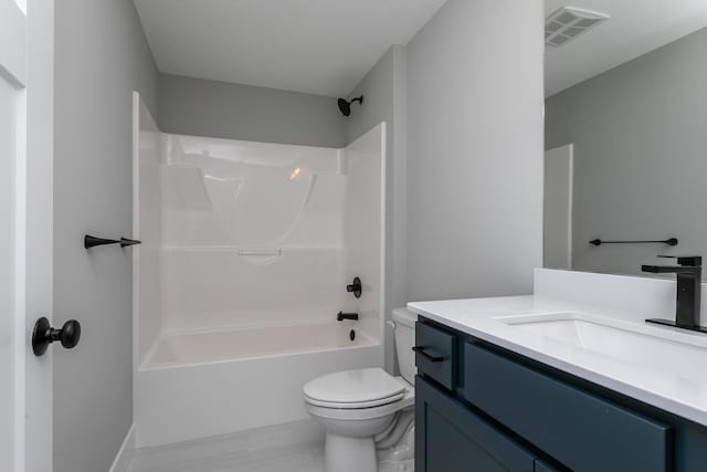 700 Brockton Dr, Columbia, MO 65201 - bathroom featuring toilet,  shower combination, vanity, and marble look tile flooring