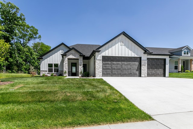 700 Sagemoor Dr, Columbia, MO 65201 - modern farmhouse style home featuring board and batten siding, a garage, and stone siding