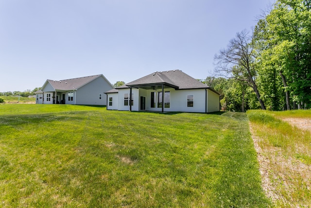 700 Sagemoor Dr, Columbia, MO 65201 - rear view of property featuring ceiling fan and a yard