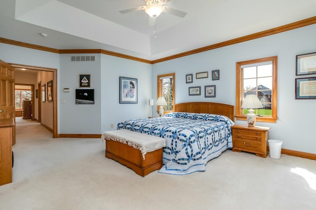 bedroom featuring carpet, a ceiling fan, crown molding, visible vents, and baseboards