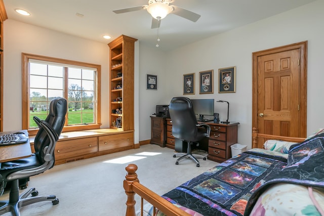 carpeted home office with a ceiling fan and recessed lighting