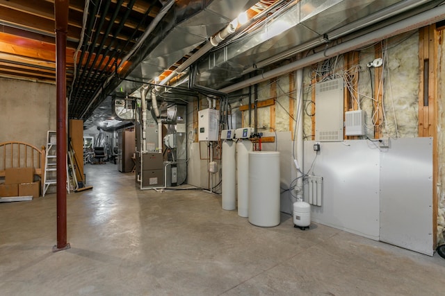 unfinished basement with heating unit and water heater