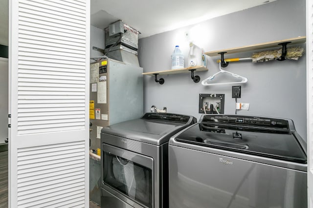 washroom featuring laundry area and separate washer and dryer