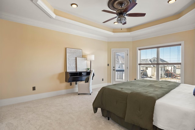 3207 Rivington Dr, Columbia, MO 65203 - carpeted bedroom with a tray ceiling, crown molding, access to outside, baseboards, and a ceiling fan