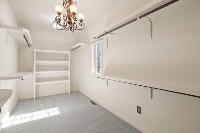 3207 Rivington Dr, Columbia, MO 65203 - walk in closet with carpet and a chandelier