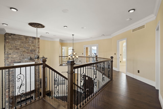 3207 Rivington Dr, Columbia, MO 65203 - hallway featuring an upstairs landing, dark wood-type flooring, a chandelier, baseboards, and ornamental molding