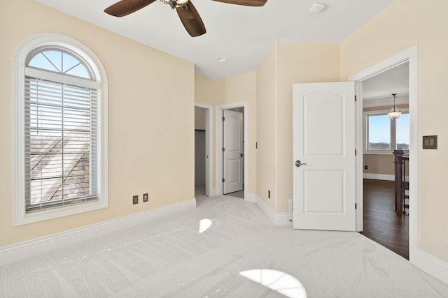 3207 Rivington Dr, Columbia, MO 65203 - unfurnished bedroom with baseboards, carpet, and ceiling fan