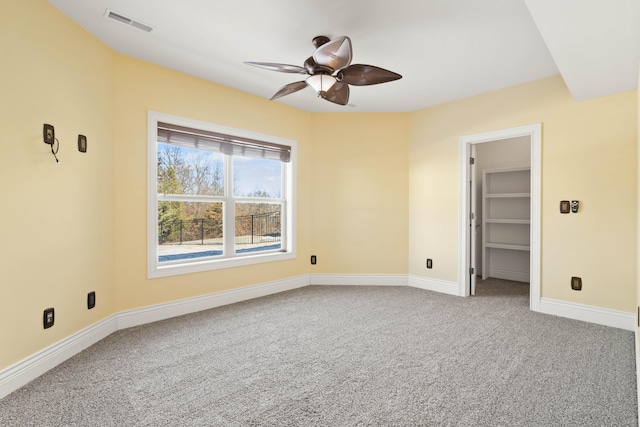 3207 Rivington Dr, Columbia, MO 65203 - empty room featuring ceiling fan, carpet flooring, and baseboards
