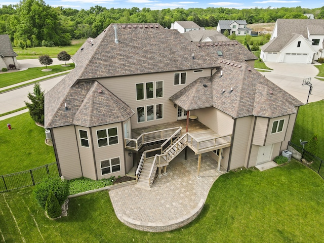 3207 Rivington Dr, Columbia, MO 65203 - rear view of house with a deck, stairs, a patio area, and a shingled roof