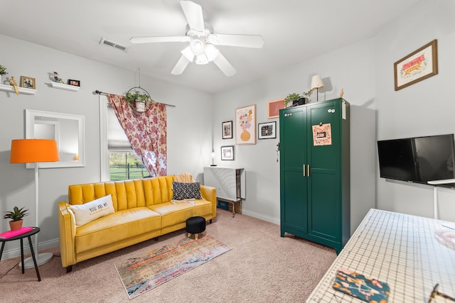 5109 Newbury Way, Columbia, MO 65203 - living room featuring light carpet, visible vents, baseboards, and ceiling fan