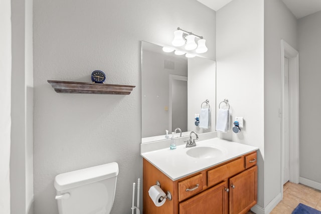 5109 Newbury Way, Columbia, MO 65203 - half bath featuring tile patterned floors, toilet, and vanity
