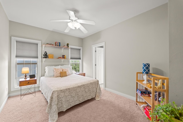 5109 Newbury Way, Columbia, MO 65203 - bedroom featuring baseboards, a ceiling fan, and light colored carpet