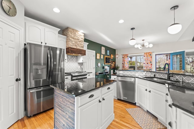 5109 Newbury Way, Columbia, MO 65203 - kitchen featuring a sink, backsplash, white cabinets, and stainless steel appliances