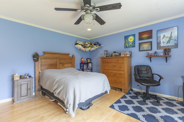30 Holman Rd, Moberly, MO 65270 - bedroom with crown molding, wood finished floors, baseboards, and a ceiling fan
