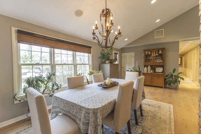 30 Holman Rd, Moberly, MO 65270 - dining space featuring an inviting chandelier, light wood-style flooring, visible vents, recessed lighting, and lofted ceiling