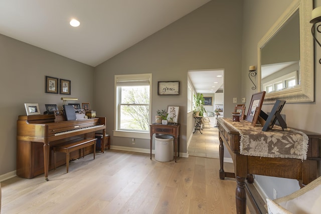 30 Holman Rd, Moberly, MO 65270 - living area featuring high vaulted ceiling, recessed lighting, light wood-type flooring, and baseboards
