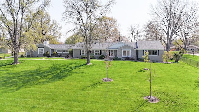 30 Holman Rd, Moberly, MO 65270 - view of front of house with a front yard and fence