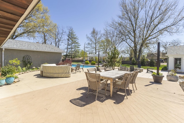 30 Holman Rd, Moberly, MO 65270 - view of patio with an outdoor pool, outdoor dining space, and a wooden deck