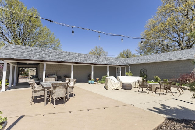 30 Holman Rd, Moberly, MO 65270 - view of patio featuring outdoor dining area and outdoor lounge area