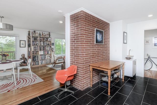 tiled living room with recessed lighting and baseboards