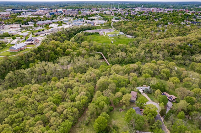 aerial overview of property's location featuring a forest