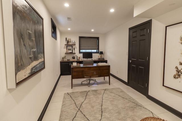 office space with recessed lighting, light tile patterned floors, and baseboards