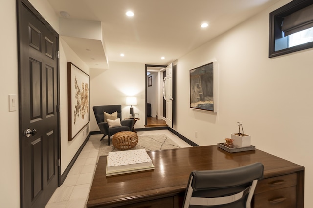 office space with recessed lighting, light tile patterned floors, and baseboards