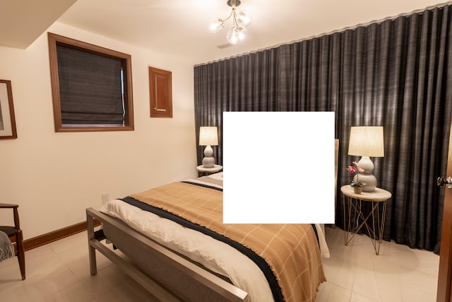 bedroom featuring baseboards