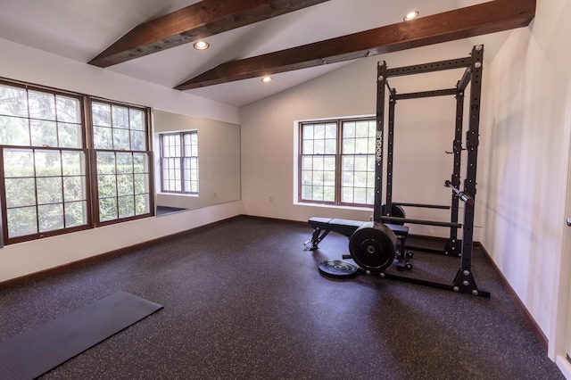 workout area featuring baseboards, lofted ceiling, recessed lighting, and healthy amount of natural light