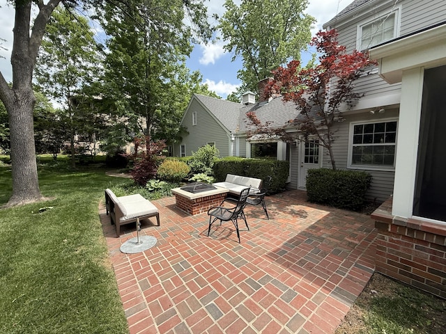 view of patio / terrace featuring a fire pit