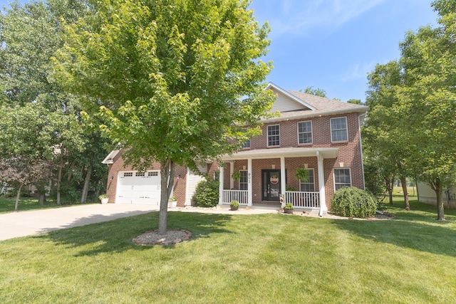 901 Fox Run, Moberly, MO 65270 - view of front of home with a porch, concrete driveway, brick siding, an attached garage, and a front lawn