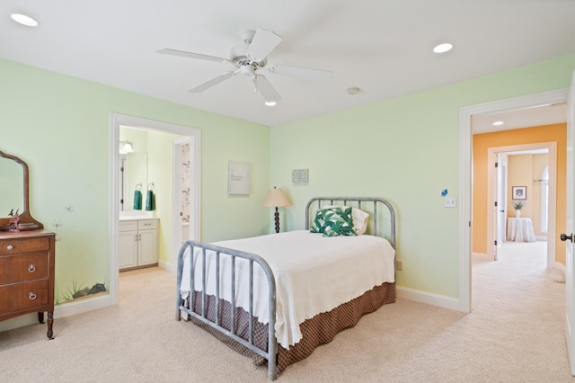 carpeted bedroom featuring ensuite bath, ceiling fan, baseboards, and recessed lighting