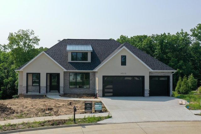 4510 Stonington Ct, Columbia, MO 65203 - view of front of property with stucco siding, driveway, and stone siding