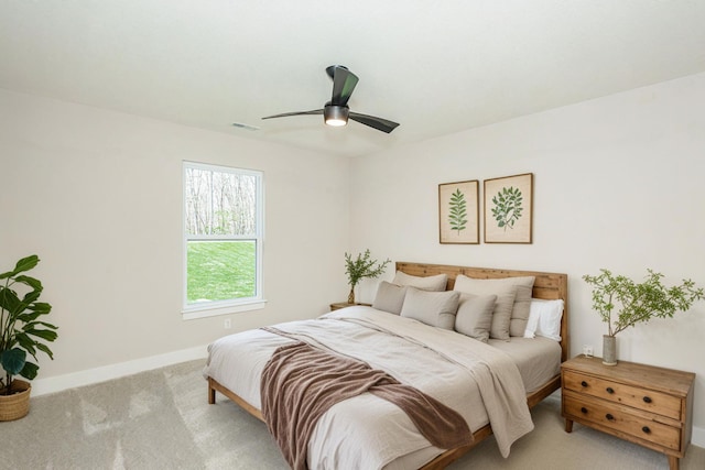 709 Sagemoor Dr, Columbia, MO 65201 - bedroom featuring baseboards, visible vents, light colored carpet, and ceiling fan