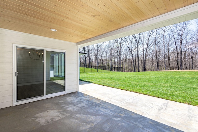 709 Sagemoor Dr, Columbia, MO 65201 - view of patio / terrace featuring fence and a view of trees